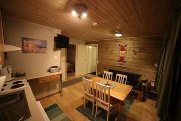 Фото номера Апартаменты с сауной (для 4 взрослых) Курортные отели Holiday Village Nuorgamin Lomakeskus г. Нуоргам 4