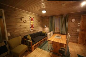 Фото номера Апартаменты с сауной (для 4 взрослых) Курортные отели Holiday Village Nuorgamin Lomakeskus г. Нуоргам 3