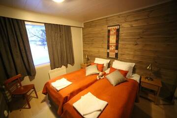 Фото номера Апартаменты с 2 спальнями и сауной Курортные отели Holiday Village Nuorgamin Lomakeskus г. Нуоргам 3