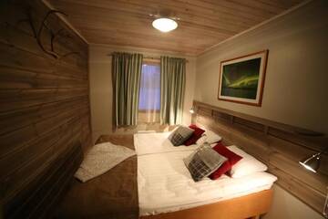 Фото номера Апартаменты с сауной (для 2 взрослых) Курортные отели Holiday Village Nuorgamin Lomakeskus г. Нуоргам 11
