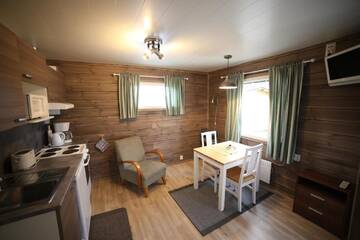 Фото номера Двухместный номер с 1 кроватью и ванной комнатой Курортные отели Holiday Village Nuorgamin Lomakeskus г. Нуоргам 2