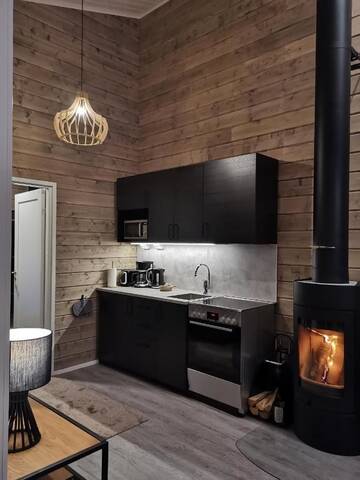 Фото номера Улучшенные апартаменты с сауной Курортные отели Holiday Village Nuorgamin Lomakeskus г. Нуоргам 9